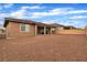 Expansive backyard featuring a covered patio, perfect for outdoor entertaining and relaxation at 741 Monroe Hill Pl, Henderson, NV 89011