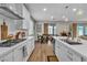 Modern kitchen with stainless steel appliances and an island with bar seating at 741 Monroe Hill Pl, Henderson, NV 89011
