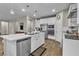 Spacious kitchen with stainless steel appliances and a large island at 741 Monroe Hill Pl, Henderson, NV 89011