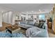 Comfortable living area blending seamlessly with a modern kitchen and dining space at 741 Monroe Hill Pl, Henderson, NV 89011