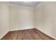 Neutral-toned bedroom features hardwood flooring and is versatile as a guest bedroom or home office at 9425 San Laguna Ct # 102, Las Vegas, NV 89134