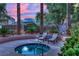Relaxing hot tub in a landscaped community area with comfortable seating at 9425 San Laguna Ct # 102, Las Vegas, NV 89134