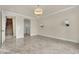 Bright room with decorative lighting and view of staircase at 9425 San Laguna Ct # 102, Las Vegas, NV 89134