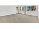 Bright and spacious bedroom with plush carpeting and large windows at 9704 Brawley Dr, Las Vegas, NV 89134