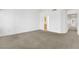 Large bedroom with neutral walls and carpet, a hallway, and closet at 9704 Brawley Dr, Las Vegas, NV 89134