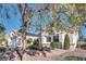 View of the front yard and facade of the house, featuring low-maintenance landscaping at 9704 Brawley Dr, Las Vegas, NV 89134