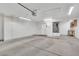 Spacious garage with plenty of storage cabinets and a concrete floor, providing ample space at 9704 Brawley Dr, Las Vegas, NV 89134
