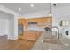 Bright kitchen featuring wood cabinets, stainless steel appliances, and granite countertops at 9704 Brawley Dr, Las Vegas, NV 89134