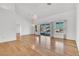 Bright living room featuring hardwood floors and large sliding glass doors to the backyard at 9704 Brawley Dr, Las Vegas, NV 89134