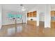 Bright open concept living room with hardwood floors and custom built-ins at 9704 Brawley Dr, Las Vegas, NV 89134