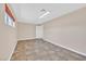 Bright basement featuring tiled flooring and white trim at 100 Ocotillo St, Henderson, NV 89015