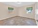 Bedroom with tile floors, green blinds, and natural lighting at 100 Ocotillo St, Henderson, NV 89015