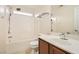 Bathroom with single sink vanity and shower over tub at 10147 Aspen Rose St # 101, Las Vegas, NV 89183
