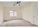 Neutral bedroom with carpet floors and a window providing natural light at 10147 Aspen Rose St # 101, Las Vegas, NV 89183