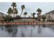 Elegant St. Rose Court community entrance with lush landscaping and stately signage creating a welcoming arrival at 10147 Aspen Rose St # 101, Las Vegas, NV 89183
