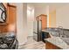 Well-lit kitchen with stainless steel appliances and granite countertops at 10147 Aspen Rose St # 101, Las Vegas, NV 89183