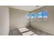 Bedroom with bright windows and carpeting throughout at 109 Medianoche St, Las Vegas, NV 89138