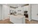 Kitchen featuring white cabinets, stainless steel appliances and center island at 109 Medianoche St, Las Vegas, NV 89138