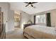 Open bedroom leading to the bathroom with natural light from the window at 1107 Cloudy Day Dr, Henderson, NV 89074