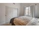 Cozy bedroom with a large closet and a window providing natural light at 1107 Cloudy Day Dr, Henderson, NV 89074