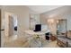 Well-lit home office featuring a white desk, modern decor, and doorway access at 1107 Cloudy Day Dr, Henderson, NV 89074