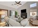 Inviting living room with a modern fireplace, comfortable seating, and lots of natural light at 1107 Cloudy Day Dr, Henderson, NV 89074