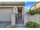 Inviting front entrance with decorative wreath, modern stone accents and pavers at 12545 Starry Heaven St, Las Vegas, NV 89138