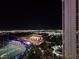 Dramatic aerial view of the city at night with bright lights at 135 E Harmon Ave # 2120, Las Vegas, NV 89109