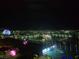 Dramatic aerial view of the city at night with bright lights at 135 E Harmon Ave # 2120, Las Vegas, NV 89109