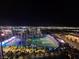 An amazing view of Top Golf Las Vegas at night with a striking view of the city skyline at 135 E Harmon Ave # 2120, Las Vegas, NV 89109
