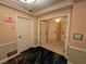 Hallway with Exit signs and multiple doors showcases security features at 135 E Harmon Ave # 2120, Las Vegas, NV 89109