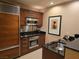 Modern kitchen features stainless steel appliances and sleek black countertops at 135 E Harmon Ave # 2120, Las Vegas, NV 89109