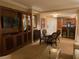Cozy living area showing a dining table, TV, and comfortable seating arrangement at 135 E Harmon Ave # 2120, Las Vegas, NV 89109
