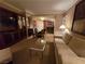 View of the living room, dining area, and kitchen, showcasing an open and inviting layout at 135 E Harmon Ave # 2120, Las Vegas, NV 89109