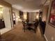 Cozy living room with a dining table and chairs, sofa, and elegant decor at 135 E Harmon Ave # 2120, Las Vegas, NV 89109