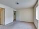 Bedroom with carpet and access to other rooms at 1412 Oak Rock Dr # 202, Las Vegas, NV 89128