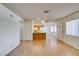 Spacious living area with modern flooring, and views into the kitchen at 1412 Oak Rock Dr # 202, Las Vegas, NV 89128