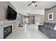 Cozy living room featuring a modern fireplace, comfortable seating, and an open layout at 1694 Clear Look Ct, Henderson, NV 89014