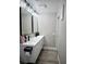Modern bathroom featuring a double sink vanity and contemporary fixtures at 2250 Red Rock St, Las Vegas, NV 89146