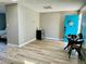 Cozy living room features a dining table, a mini fridge, and a blue door at 2250 Red Rock St, Las Vegas, NV 89146
