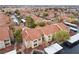Aerial view of a community featuring Spanish-style roofs and convenient covered parking at 2300 E Silverado Ranch Blvd # 1059, Las Vegas, NV 89183