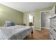 Bedroom view featuring hardwood flooring, an ensuite bath and plenty of sunlight at 2300 E Silverado Ranch Blvd # 1059, Las Vegas, NV 89183