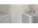Clean laundry area features a side-by-side washer and dryer for easy laundry at 2300 E Silverado Ranch Blvd # 1059, Las Vegas, NV 89183