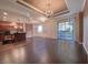 Open floor plan featuring chandelier lighting and a large sliding glass door to the patio at 2405 Serene Ave # 241, Las Vegas, NV 89123