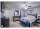 Bedroom features a bed, modern furniture, and ample natural light at 320 Ellen Marie Dr, Las Vegas, NV 89110