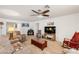The cozy living room features neutral walls, plush carpet, and plenty of space to relax and unwind at 3924 E Garfield Dr, Pahrump, NV 89061