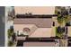 An aerial view showcasing the home's tile roof, cozy patio, and landscaping at 4012 Shetland Pony St, Las Vegas, NV 89122