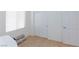 Cozy bedroom featuring neutral carpet and ample closet space at 4012 Shetland Pony St, Las Vegas, NV 89122