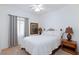 Comfortable bedroom with neutral colors and a ceiling fan at 4012 Shetland Pony St, Las Vegas, NV 89122