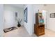 Inviting entryway featuring neutral-colored tile flooring and modern decor at 4012 Shetland Pony St, Las Vegas, NV 89122
